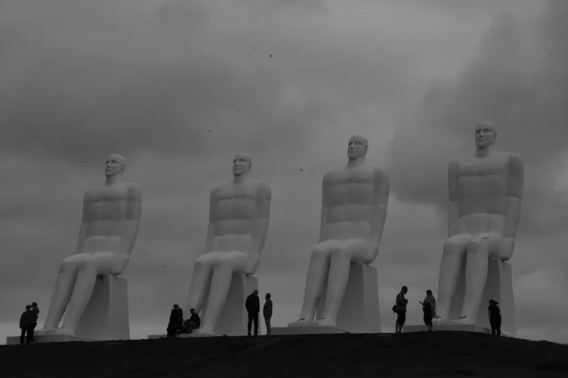 An image of four statues